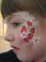 Eye Makeup: Cheekart: All Face Painting, Body Painting, and Special Effects Images on this site are Copyright@Cool Faces.
